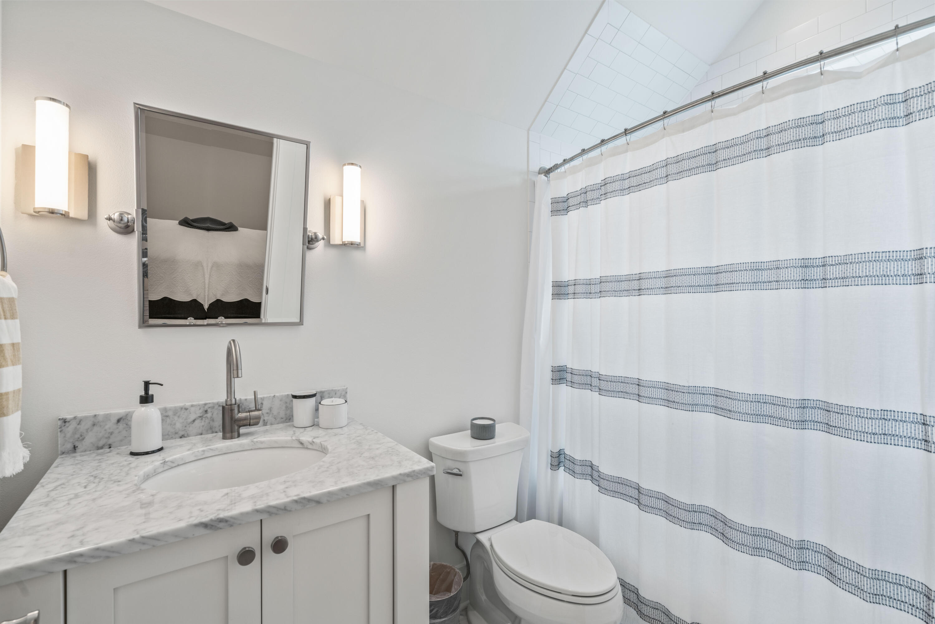 888 Pathways Dr Inlet Beach Inlet Beach, FL 32461 - Photo 34 of 43 a bathroom with a granite countertop sink mirror vanity and toilet