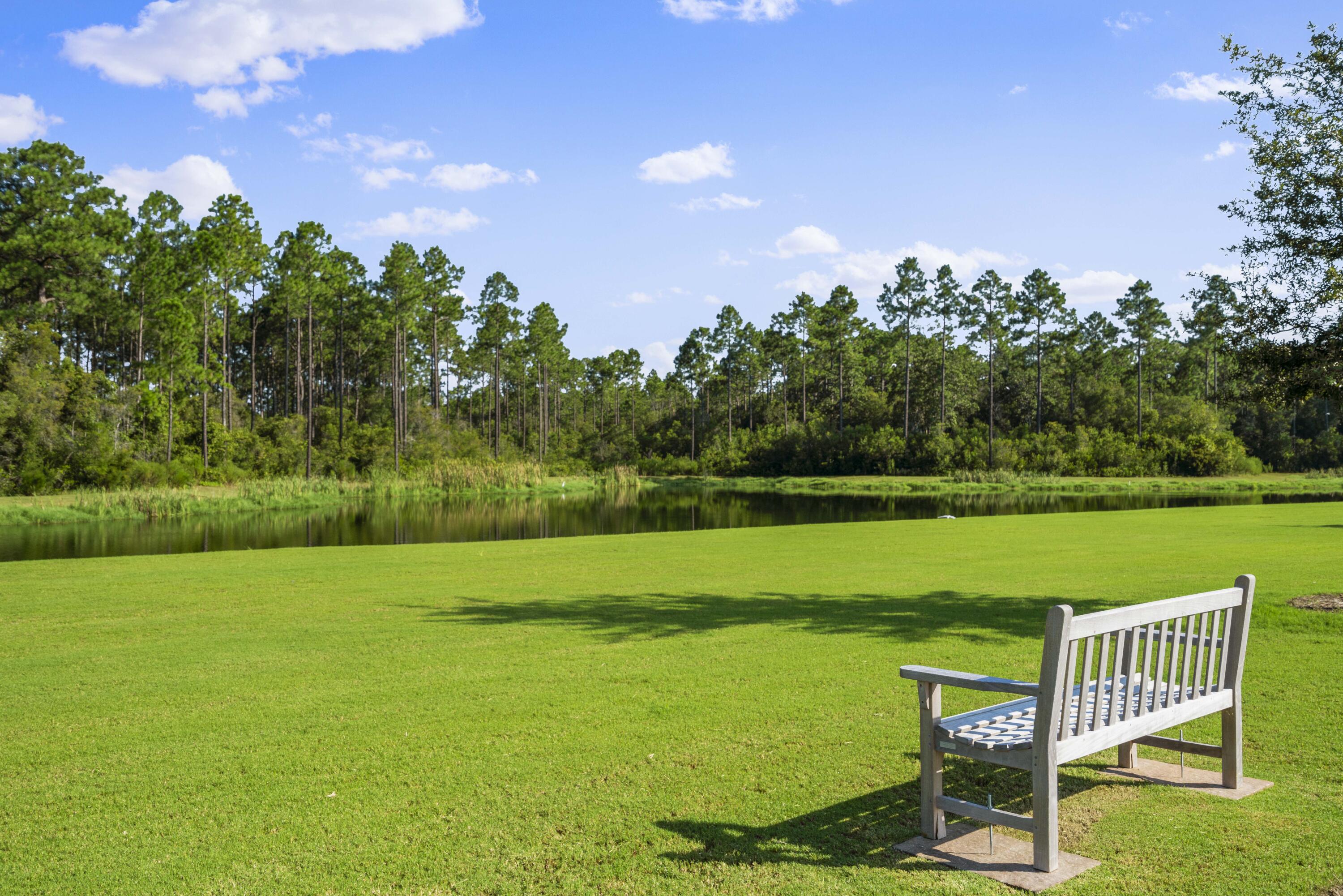 888 Pathways Dr Inlet Beach Inlet Beach, FL 32461 - Photo 4 of 43 a view of a golf course with a garden