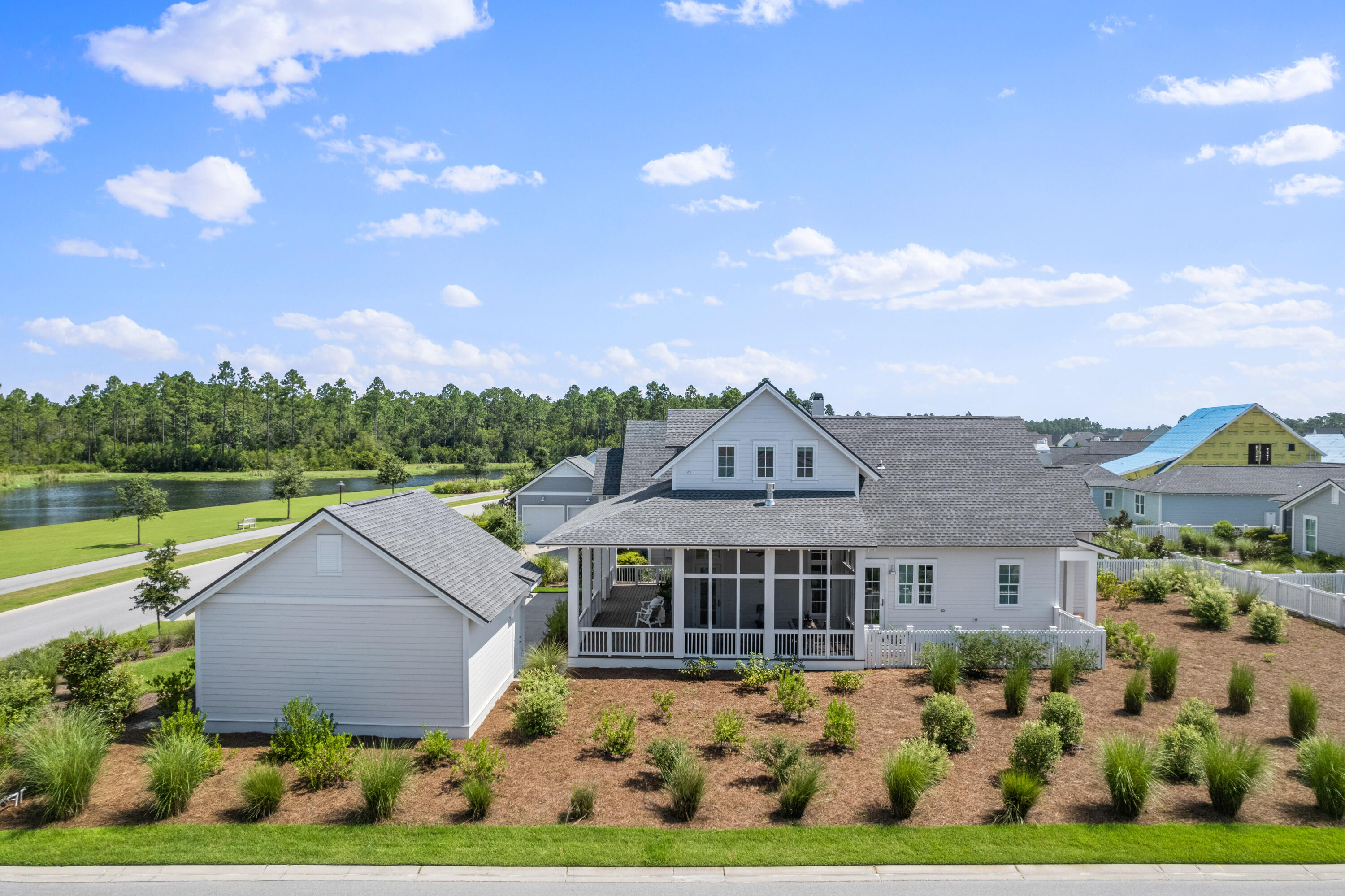 888 Pathways Dr Inlet Beach Inlet Beach, FL 32461 - Photo 41 of 43 an aerial view of a house with a big yard and large tree