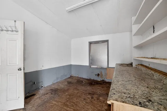 a view of a kitchen cabinets