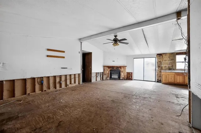 a view of livingroom with furniture and windows