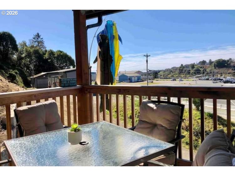 16319 Lower Harbor Road Brookings, OR 97415 - Photo 12 of 23 a view of swimming pool from a balcony
