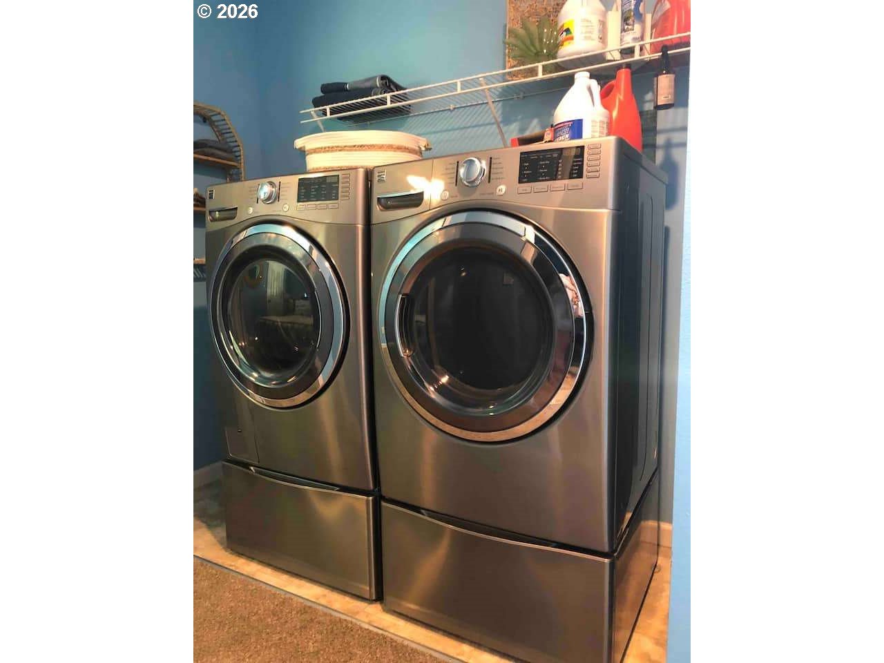 16319 Lower Harbor Road Brookings, OR 97415 - Photo 2 of 23 a utility room with dryer and washer