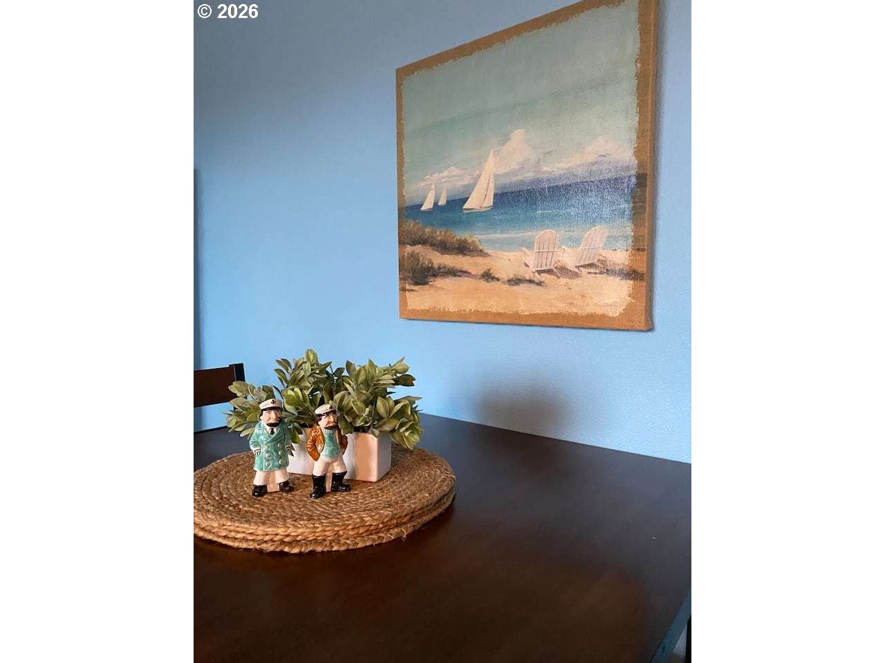 16319 Lower Harbor Road Brookings, OR 97415 - Photo 7 of 23 a vase of flowers sitting on a table