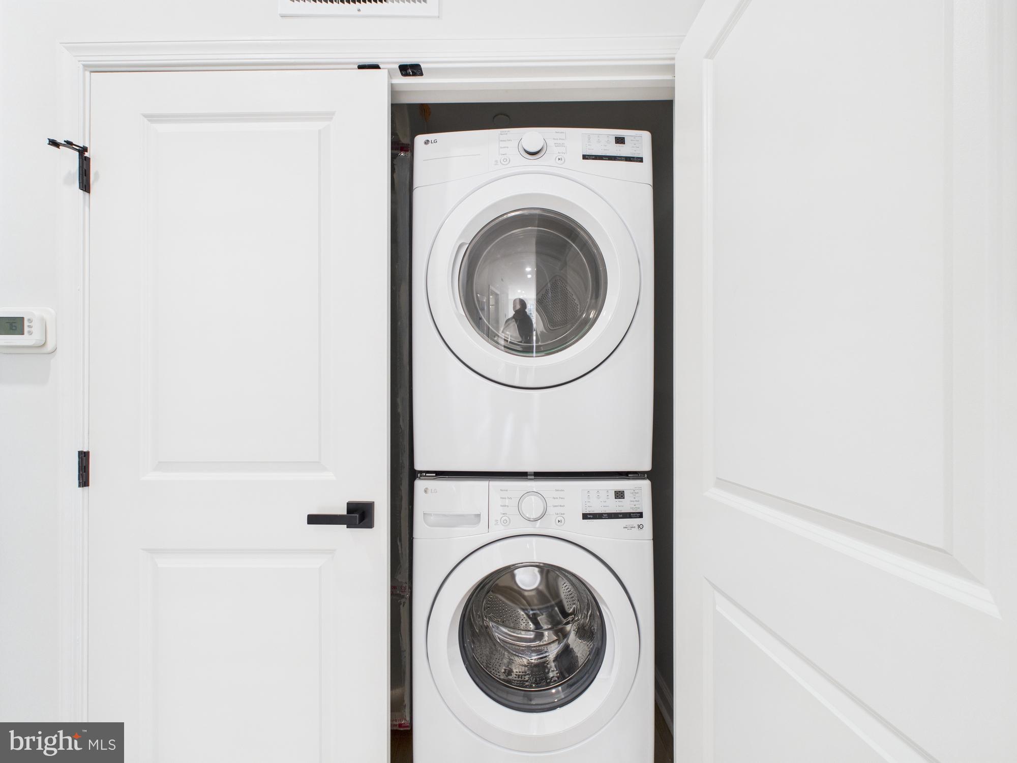 1326 Grove Street, Unit 4 Philadelphia, PA 19146 - Photo 7 of 14 a utility room with dryer and washer