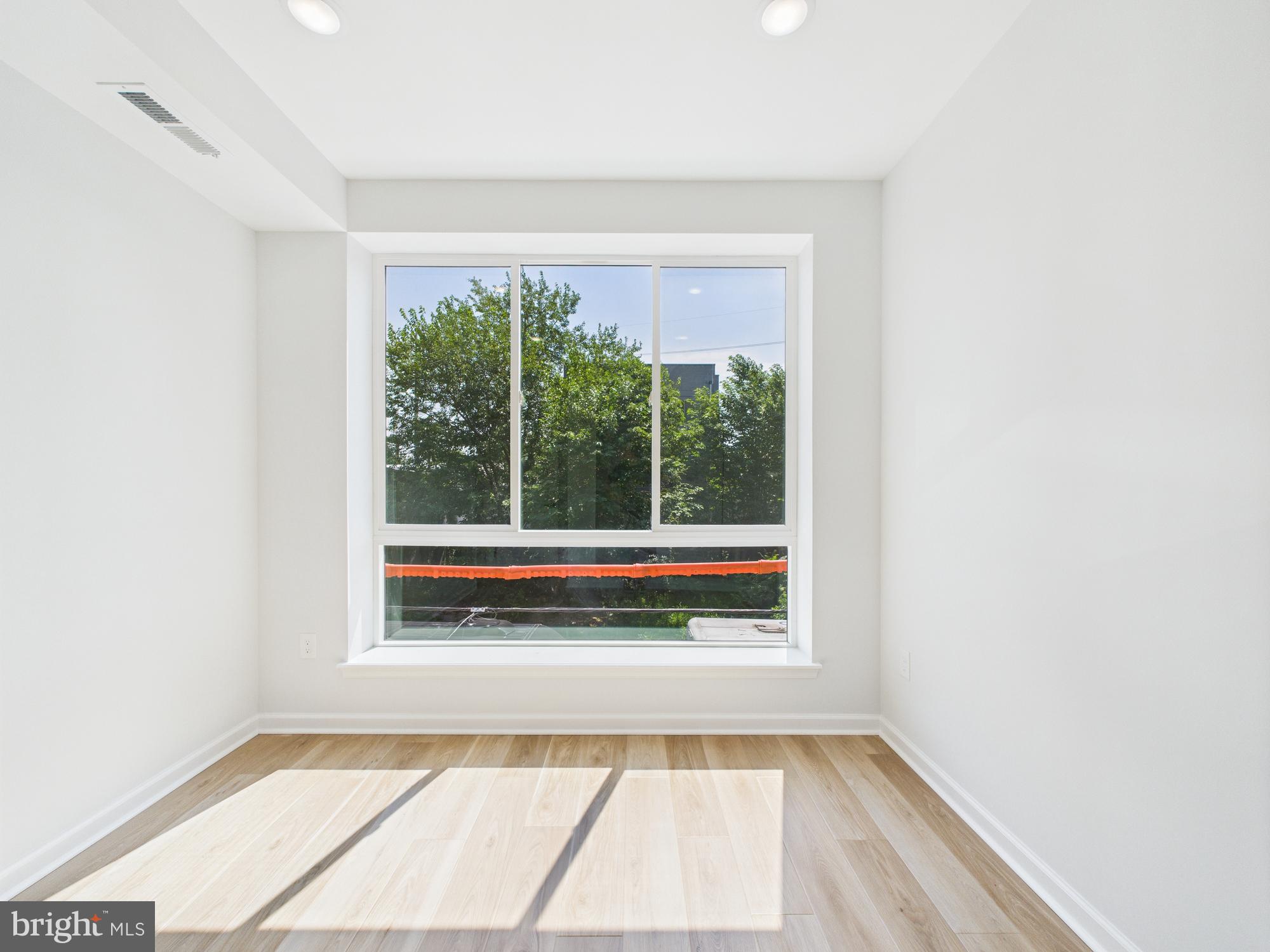 1326 Grove Street, Unit 4 Philadelphia, PA 19146 - Photo 10 of 14 a view of a room with a large window