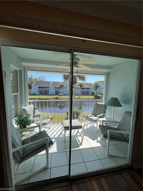 185 Grand Oaks Way, Unit R204 Naples, FL 34110 - Photo 4 of 18 a room with furniture