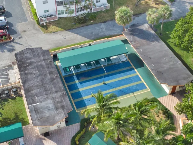 a view of a backyard with a patio