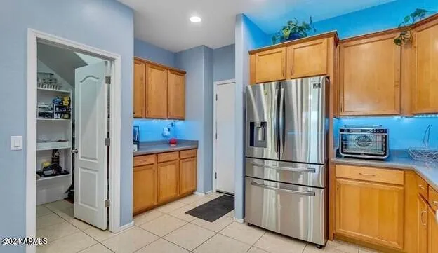 a kitchen with a sink stove and microwave