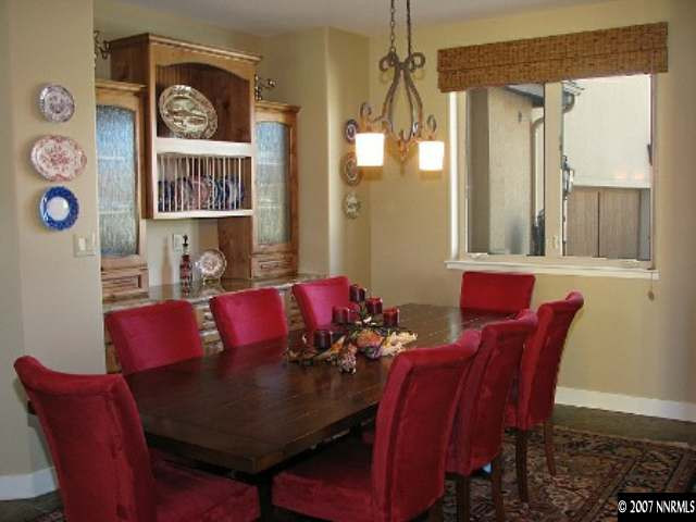 490 Genovese Lane Reno, NV 89511 - Photo 5 of 9 a view of a dining room with furniture and chandelier