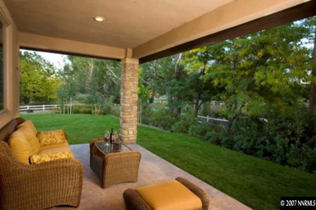 490 Genovese Lane Reno, NV 89511 - Photo 8 of 9 a view of a garden with couches in a patio