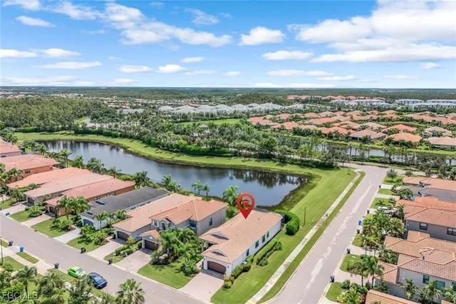 an aerial view of lake and city