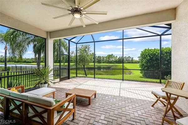 a view of a patio with a backyard table and chairs