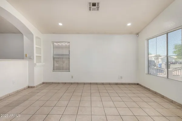an empty room with windows
