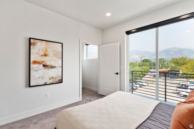 32 West 400 South Bountiful, UT 84010 - Photo 18 of 31 Carpeted bedroom featuring access to outside and a mountain view. Model Home
