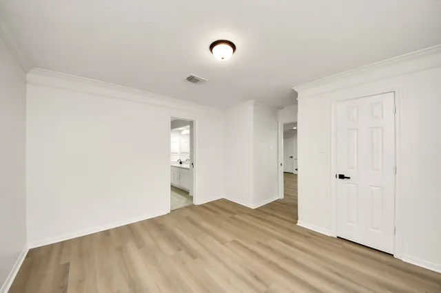 a bathroom with a sink double vanity and a mirror