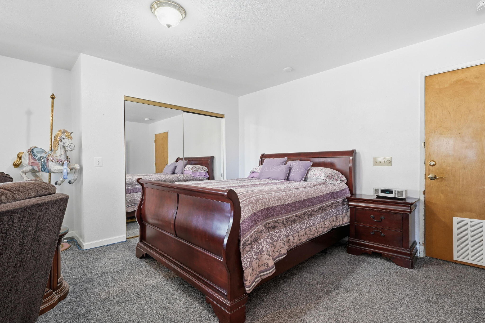 22189 Old Alturas Road Redding, CA 96003 - Photo 28 of 70 a bedroom with a bed and a dresser