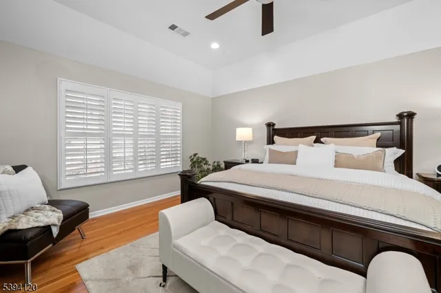 a bed room with a bed and a couch