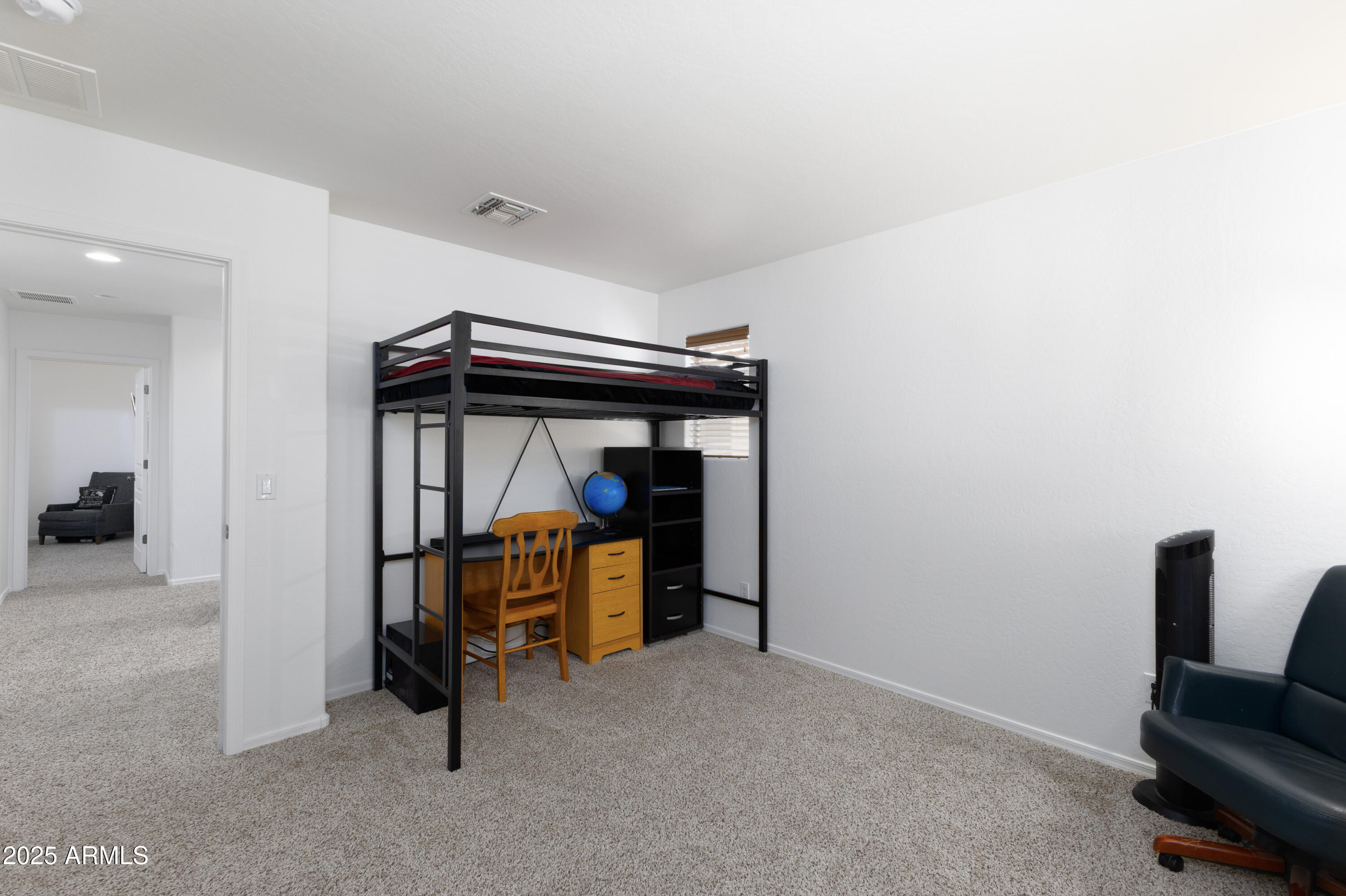 451 South Hawes Road, Unit 53 Mesa, AZ 85208 - Photo 22 of 37 a view of a livingroom with furniture and closet
