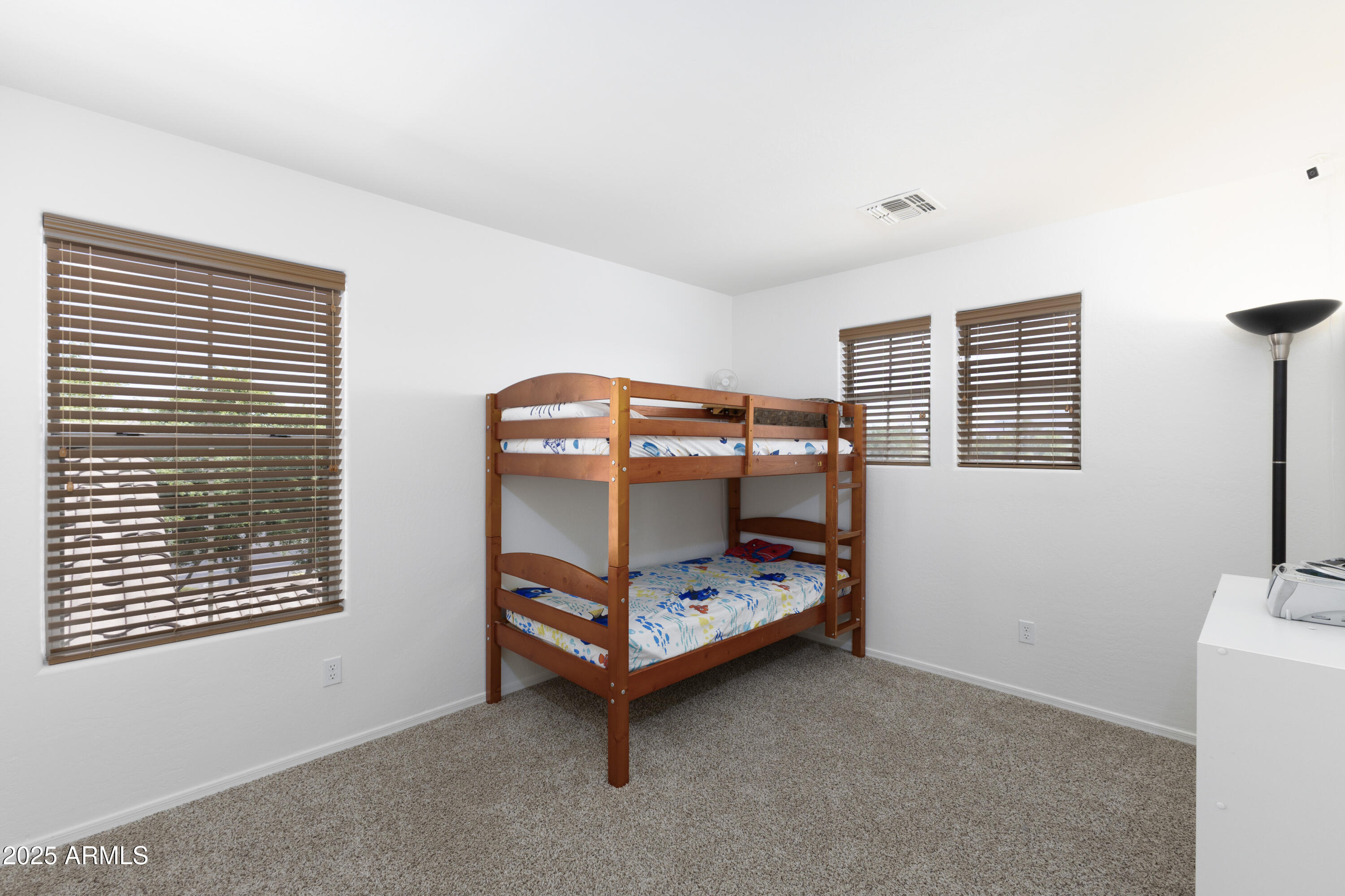 451 South Hawes Road, Unit 53 Mesa, AZ 85208 - Photo 28 of 37 a bedroom with a bed and a window