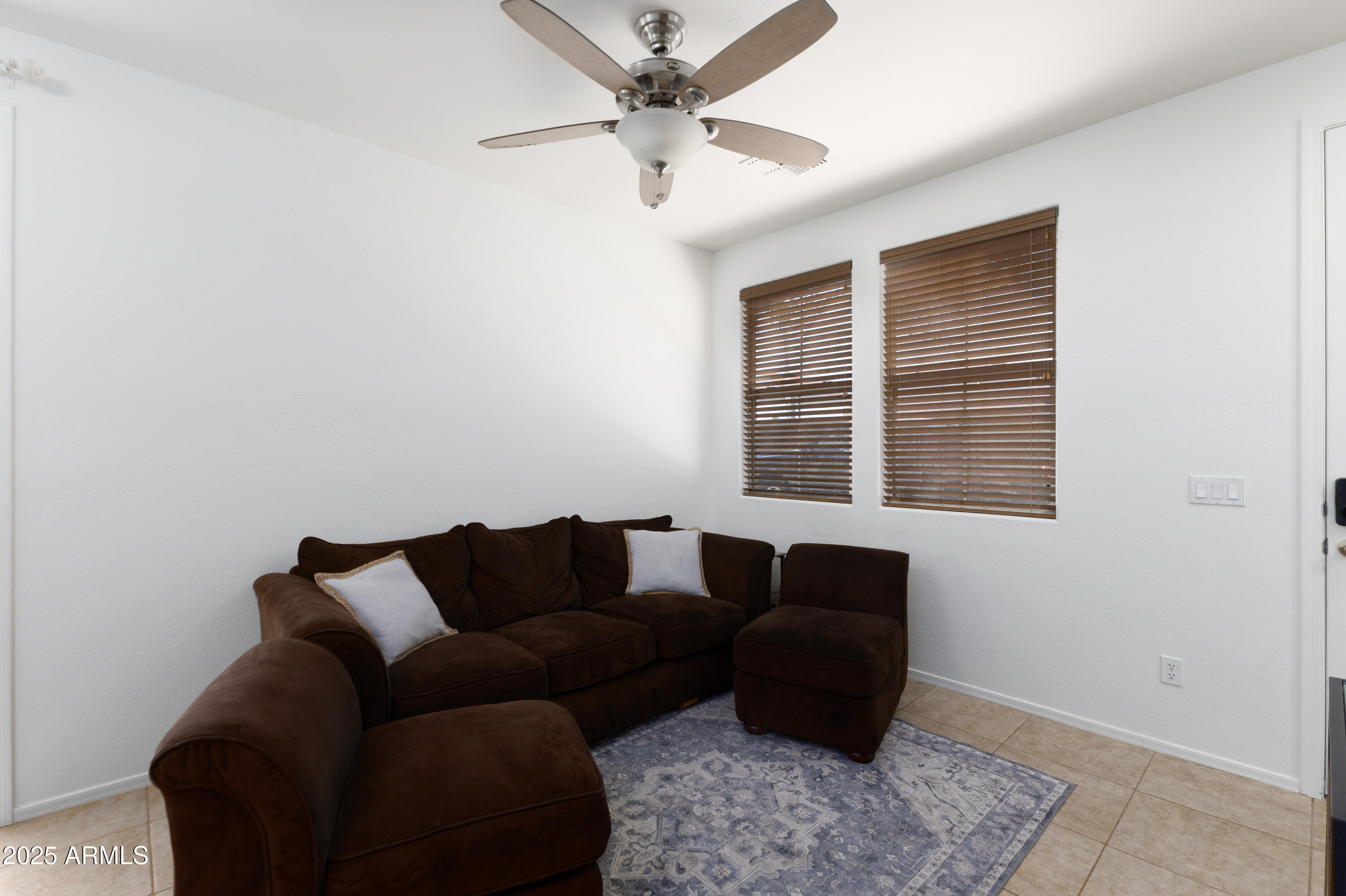 451 South Hawes Road, Unit 53 Mesa, AZ 85208 - Photo 6 of 37 a living room with furniture and a window