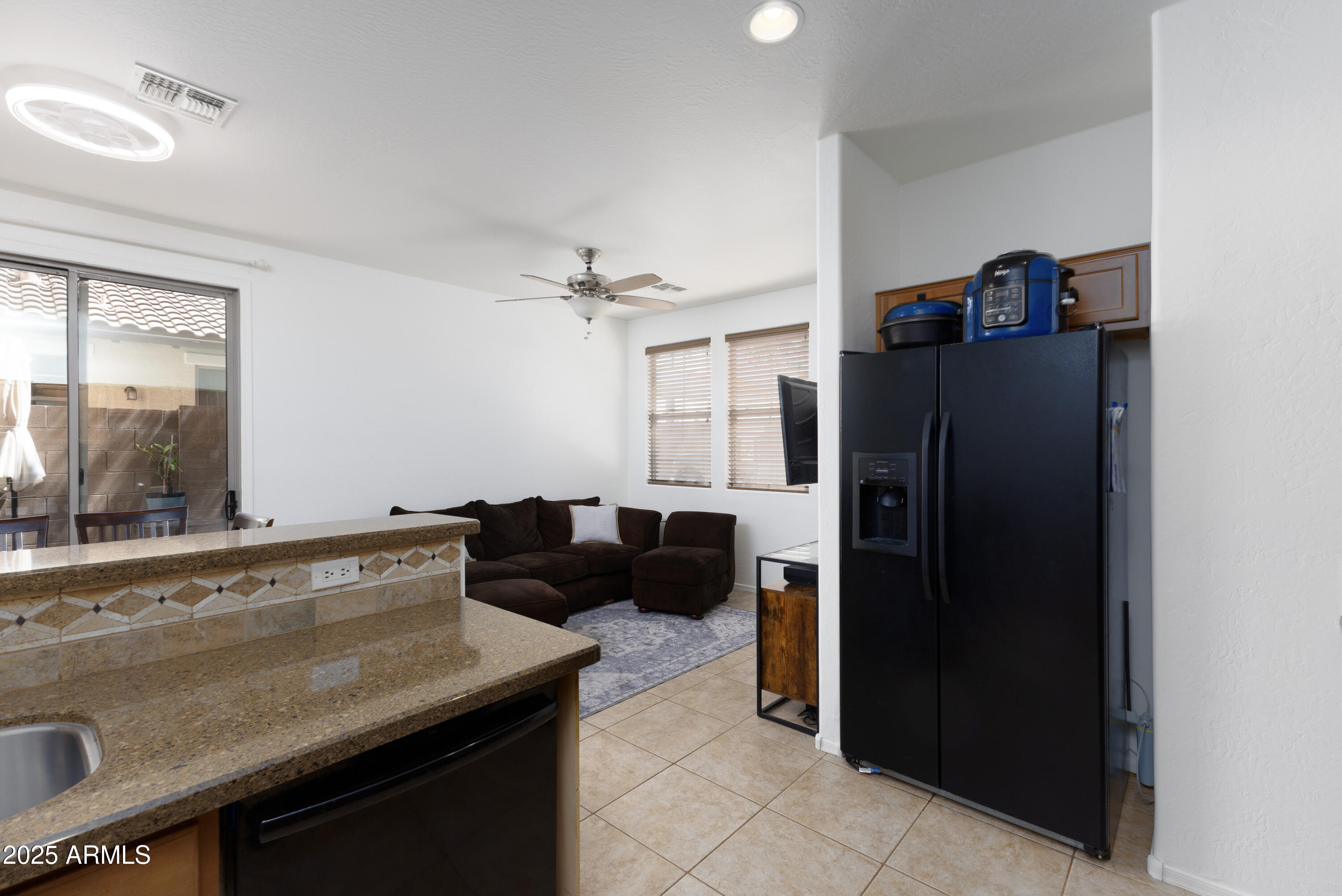 451 South Hawes Road, Unit 53 Mesa, AZ 85208 - Photo 10 of 37 a living room with stainless steel appliances granite countertop furniture a refrigerator and a sink