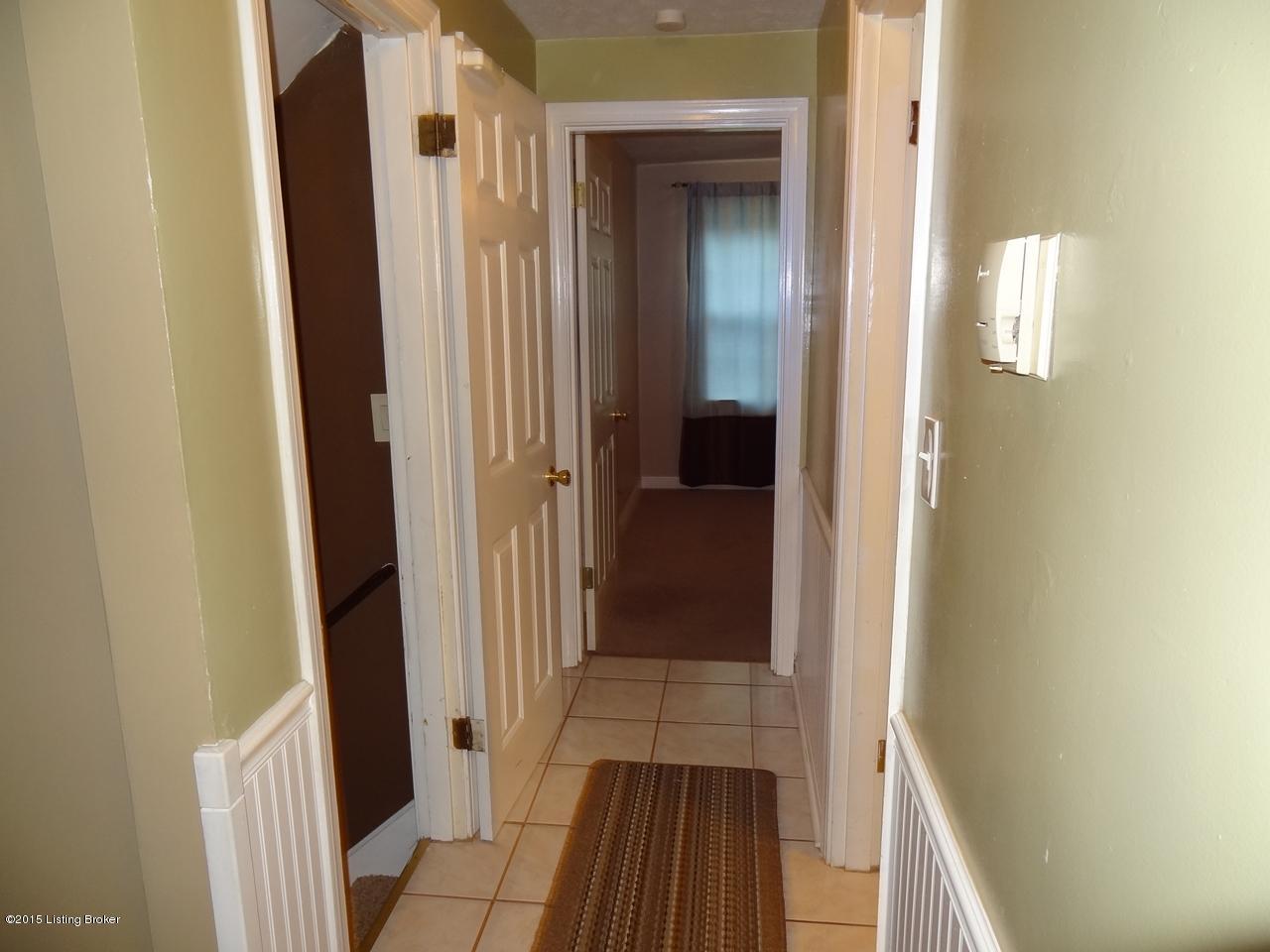 4403 Leeds Road Louisville, KY 40216 - Photo 8 of 32 Tile hallway on 1st floor