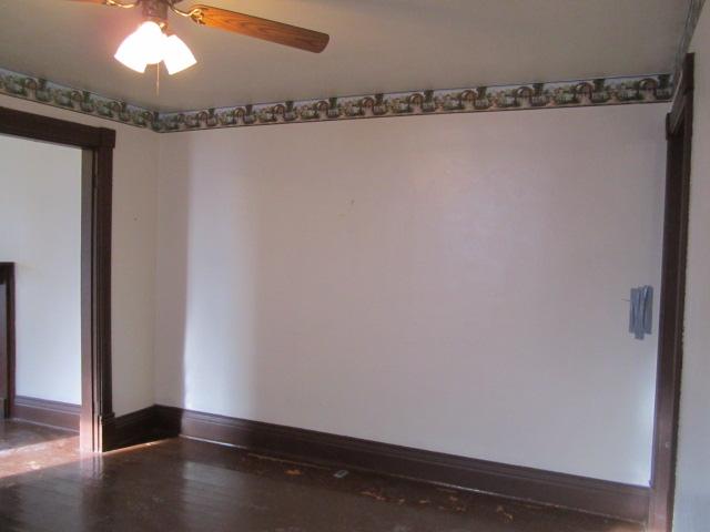 112 North Walnut Street Springfield, TN 37172 - Photo 6 of 11 a view of a room with wooden floor and a chandelier fan