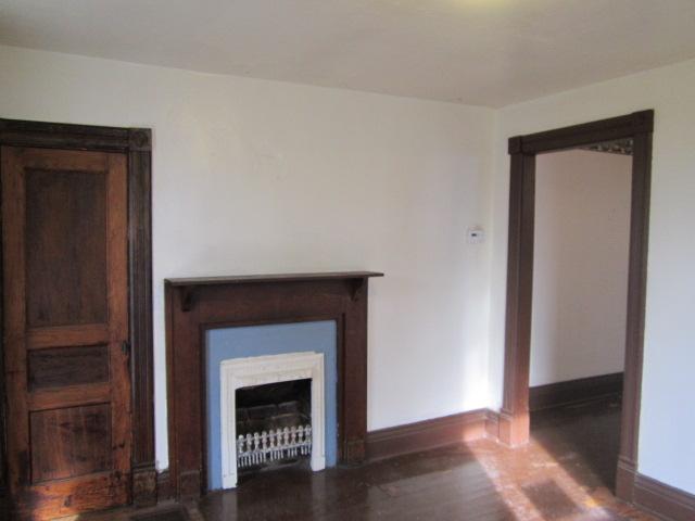 112 North Walnut Street Springfield, TN 37172 - Photo 7 of 11 a living room with a fireplace
