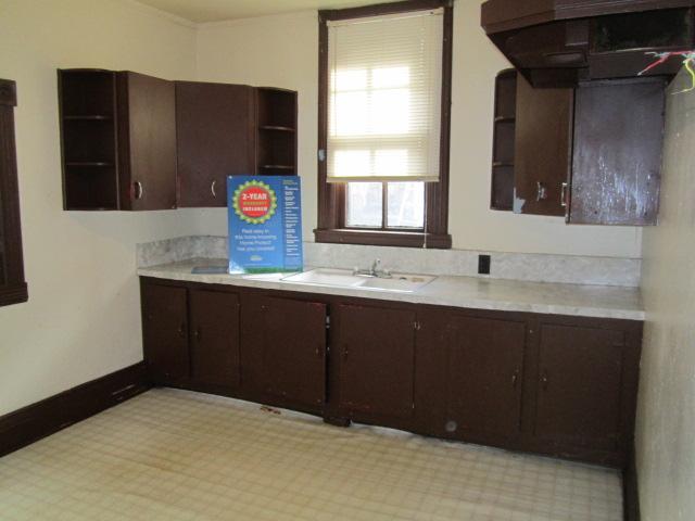 112 North Walnut Street Springfield, TN 37172 - Photo 9 of 11 a bathroom with a sink vanity and mirror