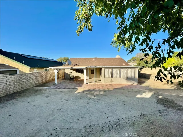 a view of a yard with a trees