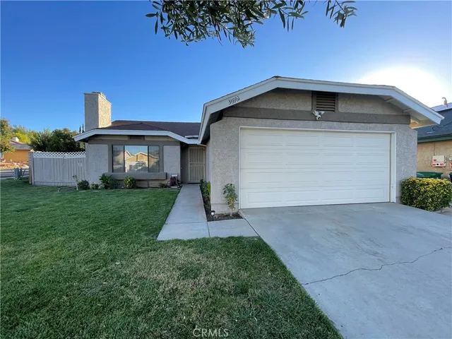 a house view with a garden space