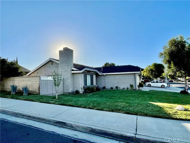 a swimming pool view with a outdoor seating