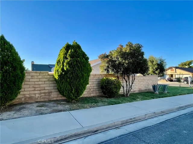 an aerial view of house with yard