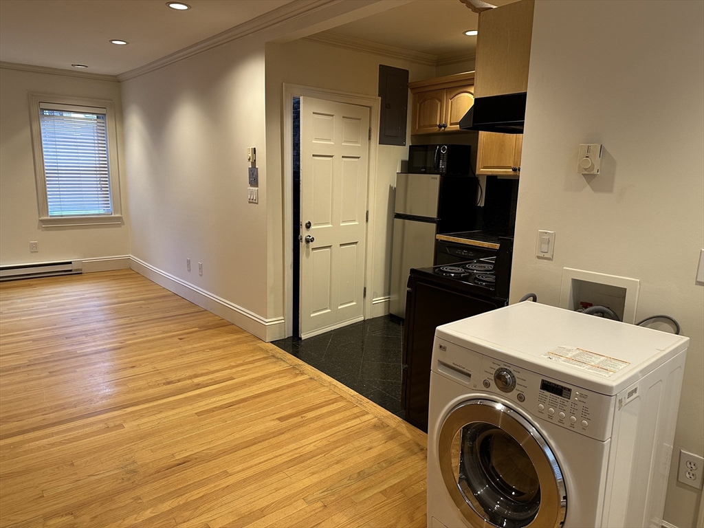 1 Hull St Court, Unit 4 Boston, MA 02113 - Photo 9 of 10 a view of kitchen and utility room