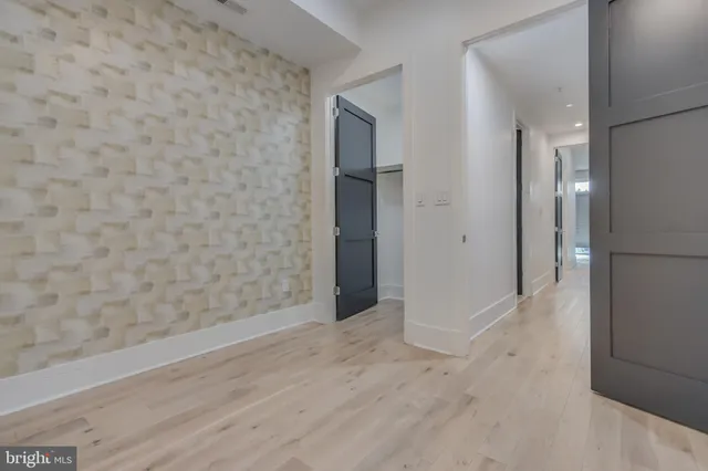 a bathroom with a sink toilet and vanity