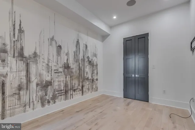 a view of balcony with wooden floor