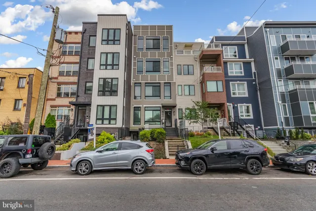 a car parked in front of a buildings