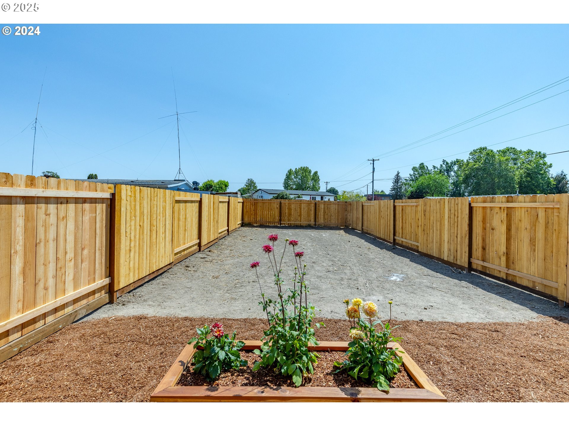 741 Periander Way Harrisburg, OR 97446 - Photo 21 of 24 a view of a backyard