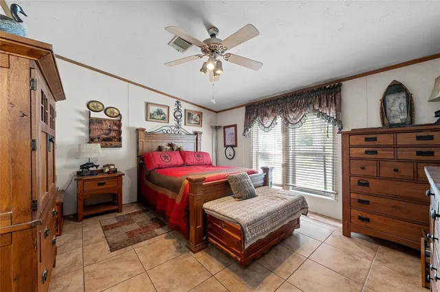 a bedroom with a bed and furniture