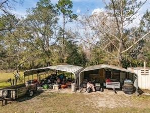 651 Old Haw Creek Road Bunnell, FL 32110 - Photo 25 of 28 a view of a car park in front of house