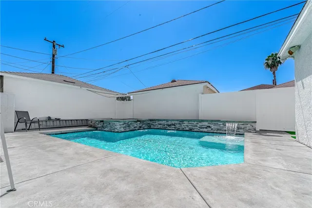 a view of a backyard with plants