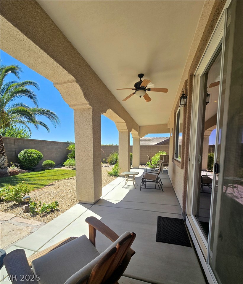 2567 Dirleton Place Henderson, NV 89044 - Photo 55 of 67 An inviting covered patio with a ceiling fan provides a pleasant outdoor living space.