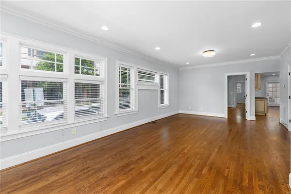 a kitchen with stainless steel appliances granite countertop a stove a sink and a granite counter tops