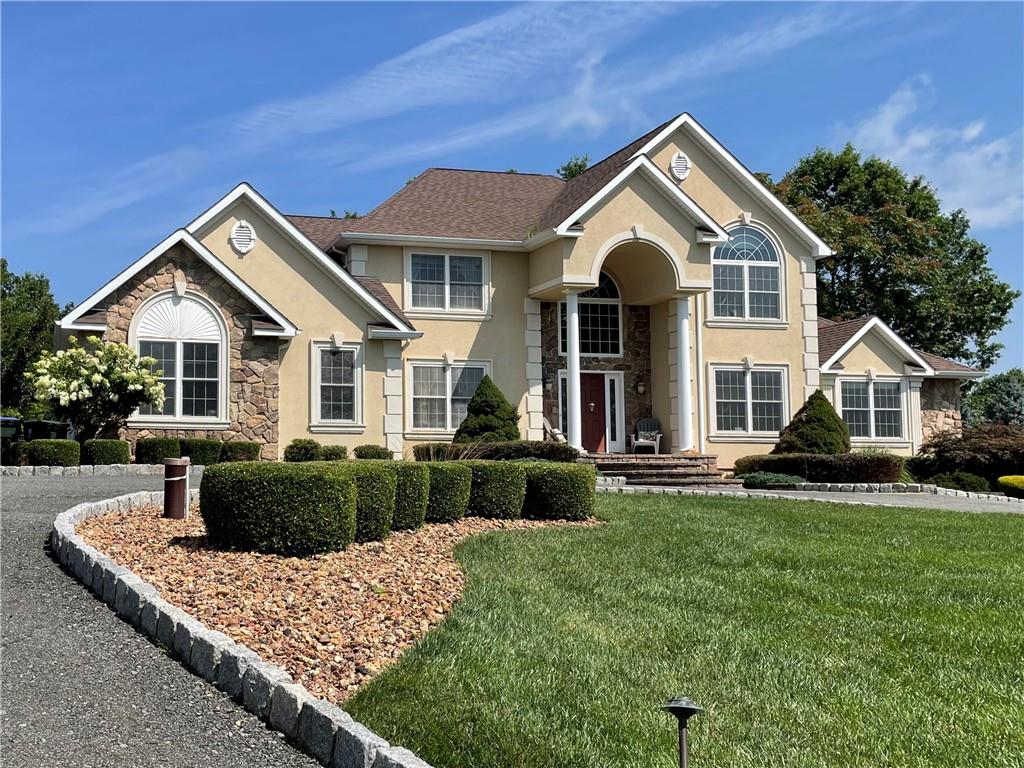 39 Rapelje Road Walden, NY 12586 - Photo 1 of 1 a front view of a house with a yard