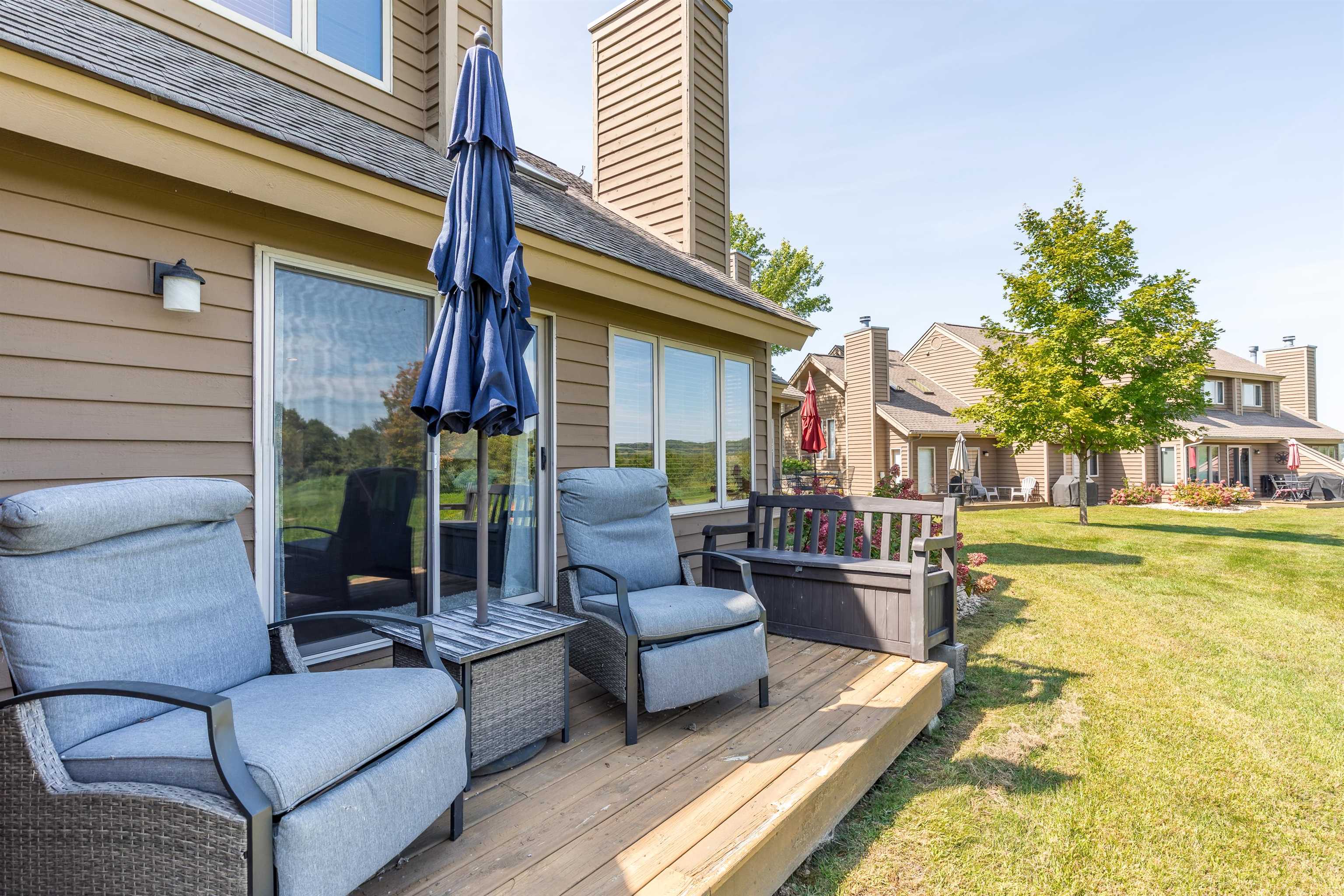 26 Poplar Ridge Galena, IL 61036 - Photo 46 of 55 a view of a patio with couches chairs and a potted plant