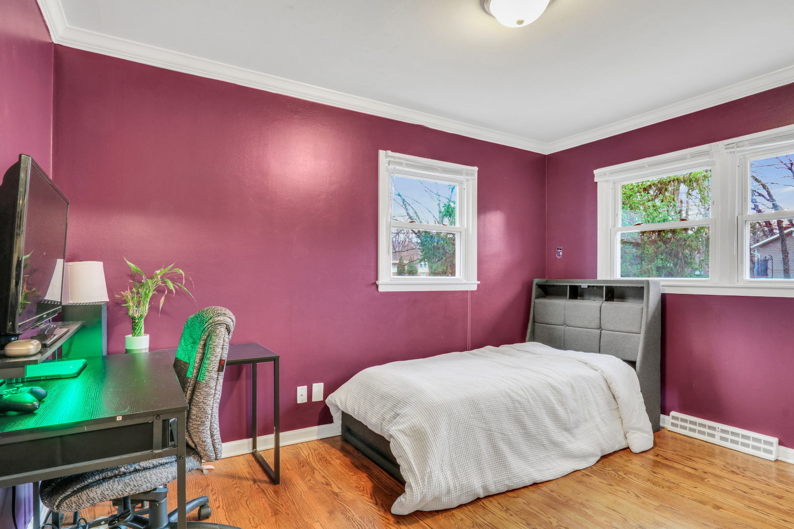 358 Rye Road Mundelein, IL 60060 - Photo 15 of 38 a bedroom with a bed dresser and a flat screen tv