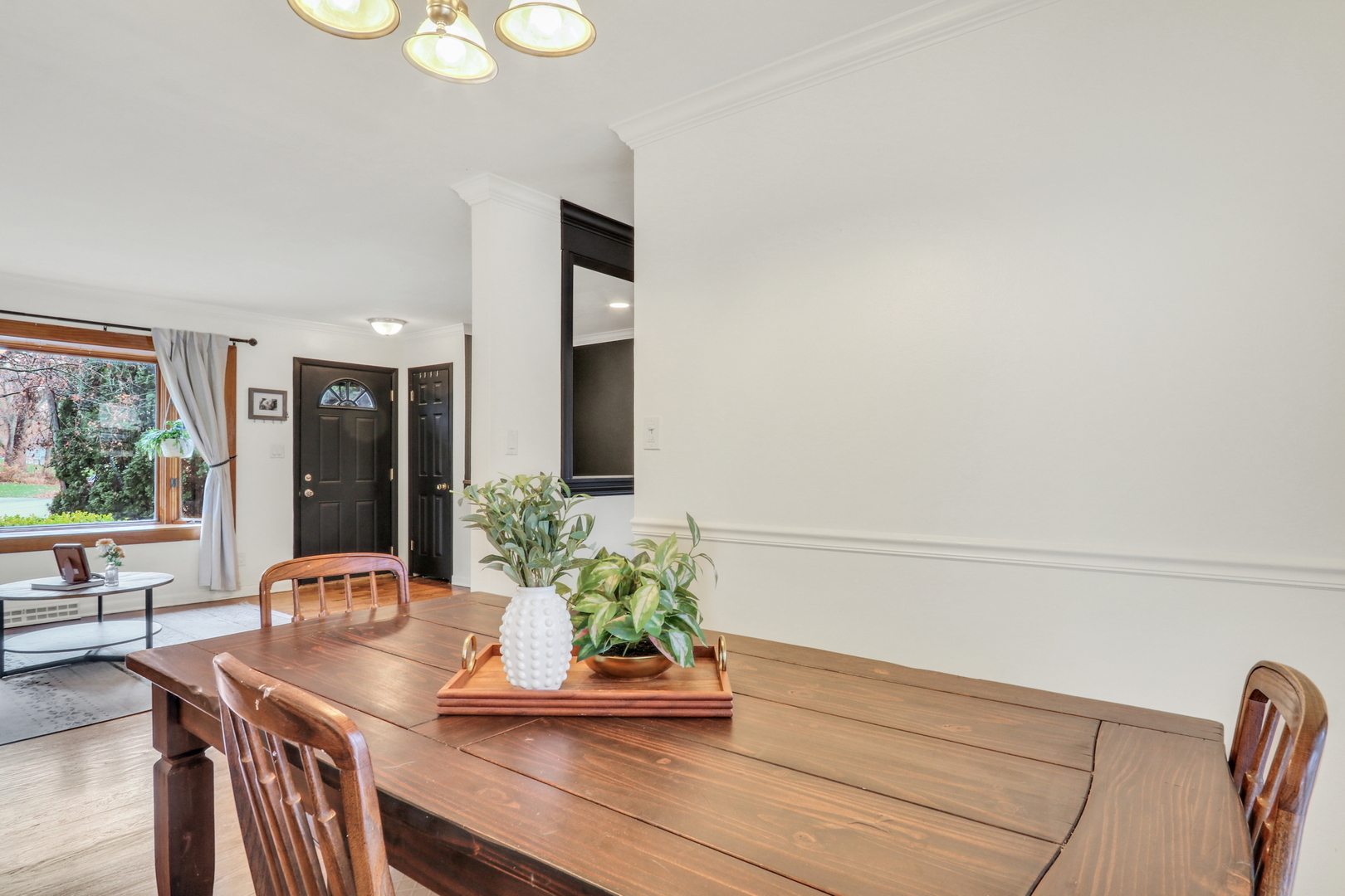 358 Rye Road Mundelein, IL 60060 - Photo 8 of 38 a view of kitchen with furniture and wooden floor