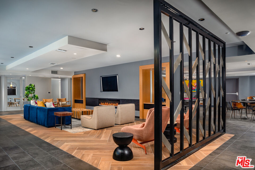 750 South Oxford Avenue, Unit 726 Los Angeles, CA 90005 - Photo 7 of 29 a living room with furniture