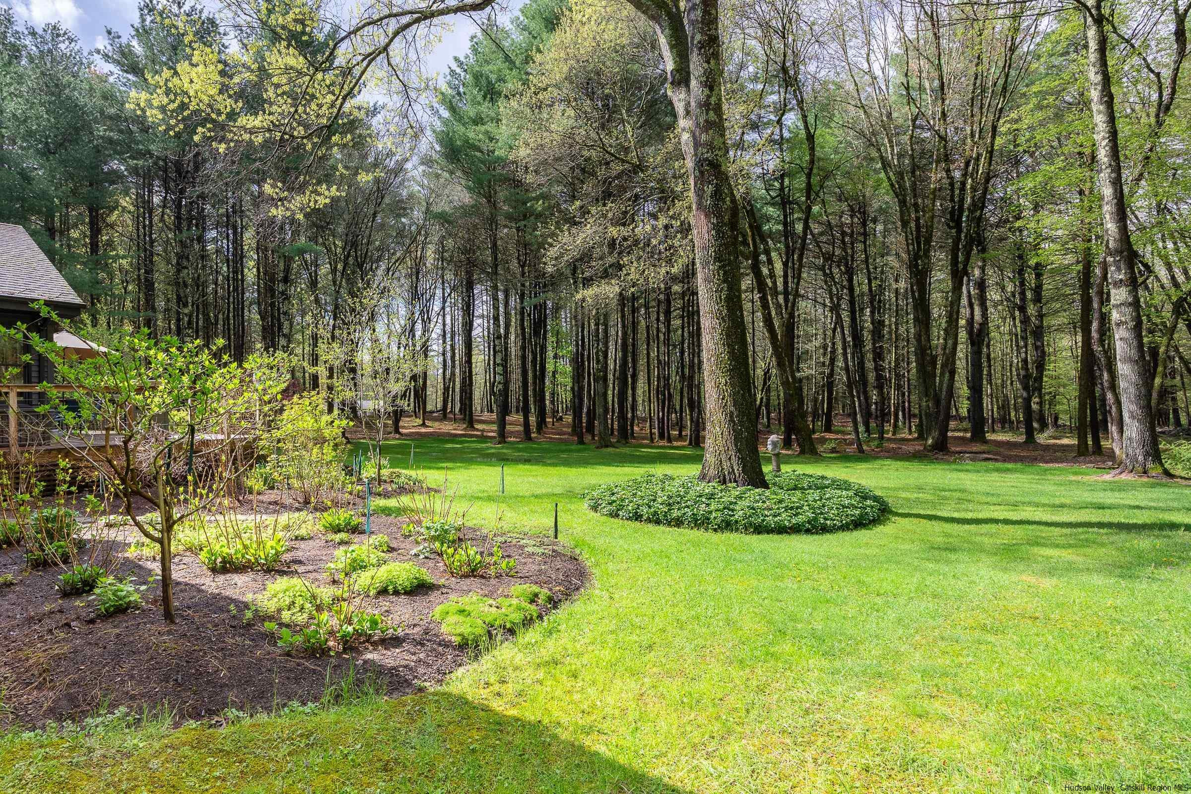 279 Scarawan Road Stone Ridge, NY 12484 - Photo 18 of 23 a garden with trees